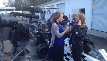 Interviewing a student at Frank Hawley's Drag Racing School for a WUFT feature